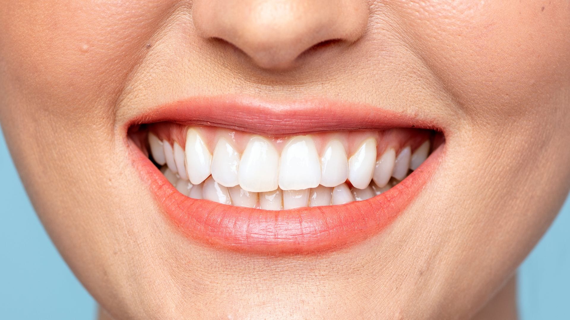 Smiling teeth - difference between crowns and bridges - Midland Bay Dental.